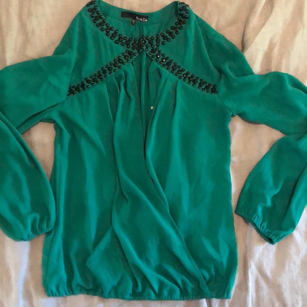 Snarl s green top